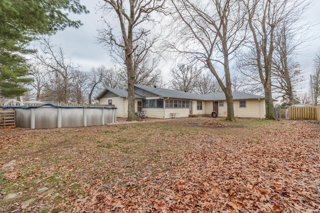 view of yard featuring a covered pool