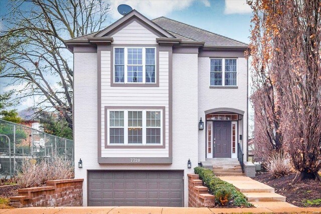 view of front of property featuring a garage