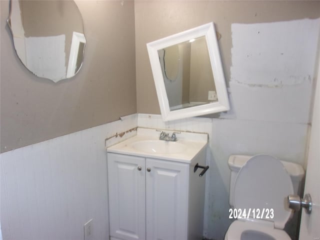 bathroom with vanity and toilet