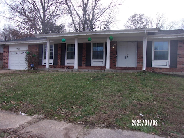 ranch-style house with a front yard and a garage