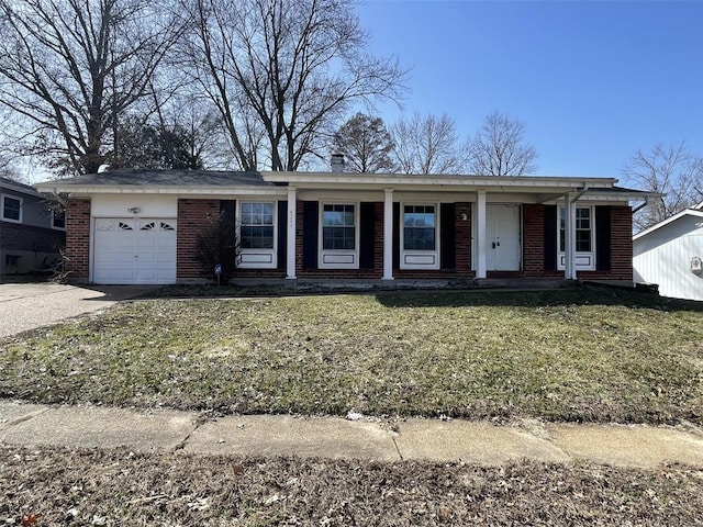 single story home featuring an attached garage, covered porch, brick siding, driveway, and a front yard