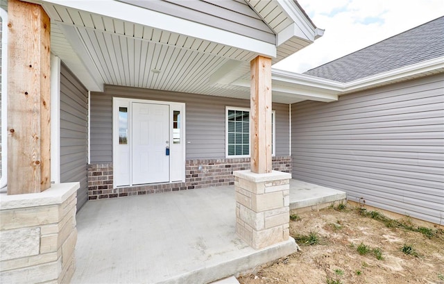 property entrance with covered porch