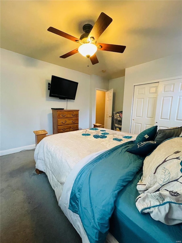 bedroom with carpet, a closet, and ceiling fan