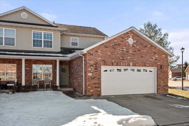 front facade with a garage