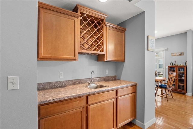 kitchen featuring sink and light hardwood / wood-style flooring