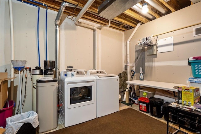 laundry room with independent washer and dryer