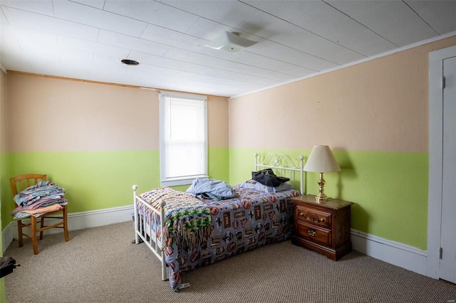 bedroom with carpet and ornamental molding