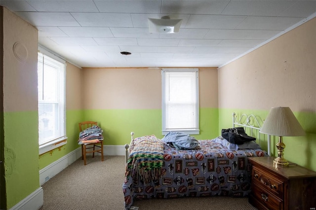 bedroom with carpet and ornamental molding