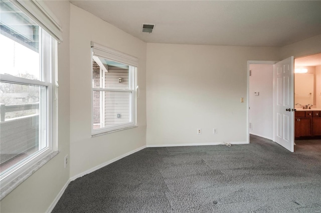 view of carpeted spare room