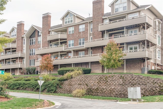 view of building exterior featuring central AC unit