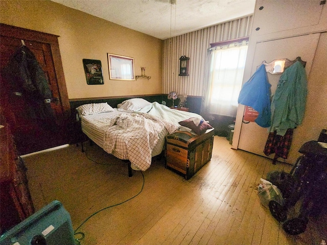 bedroom featuring wood-type flooring