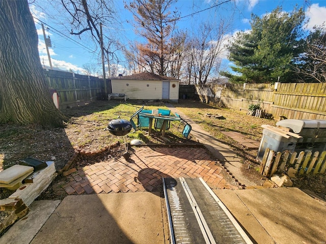 view of yard with a patio area and an outdoor structure