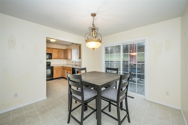 dining area featuring sink