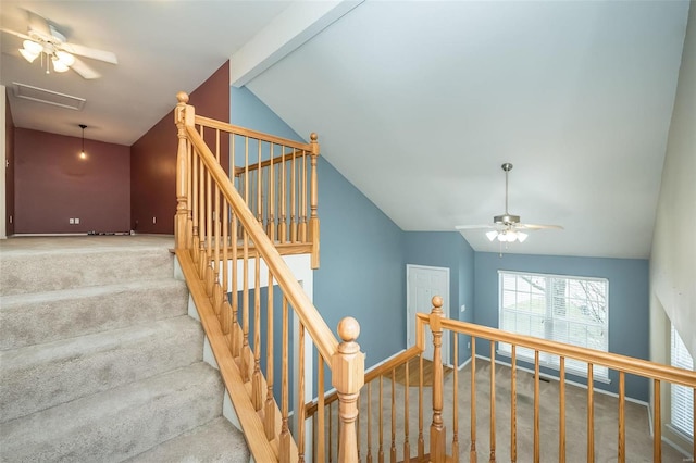 stairway with carpet flooring, vaulted ceiling with beams, and ceiling fan