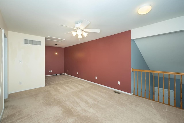 unfurnished room featuring ceiling fan and light colored carpet