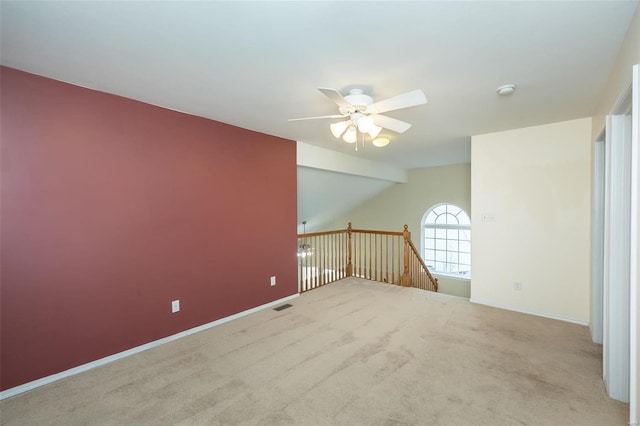 interior space with ceiling fan and vaulted ceiling