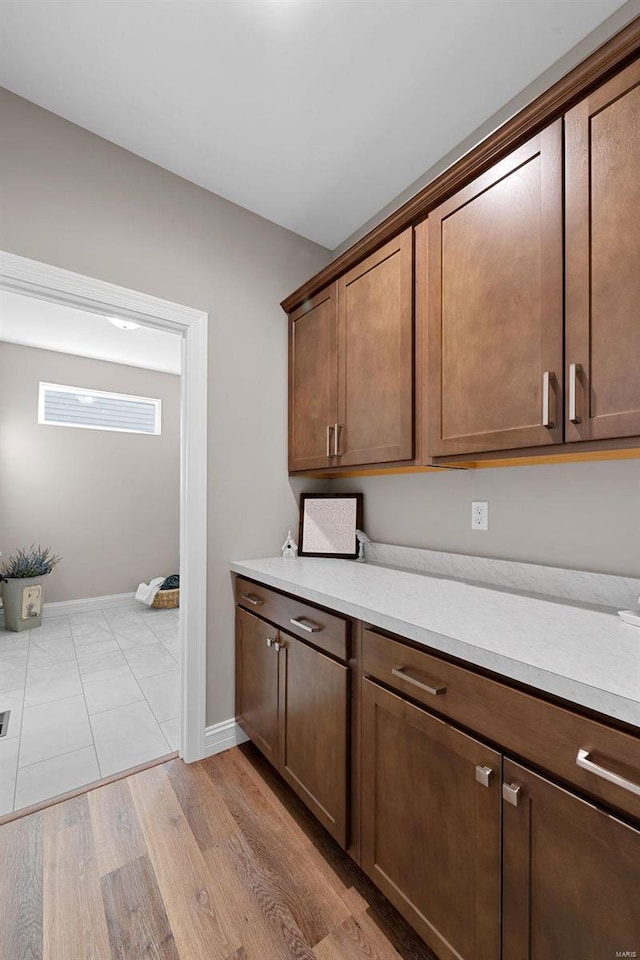 kitchen with light hardwood / wood-style floors