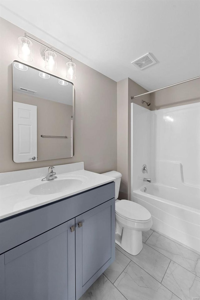 full bathroom featuring vanity, shower / bathtub combination, and toilet