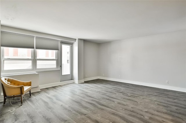 empty room featuring hardwood / wood-style floors