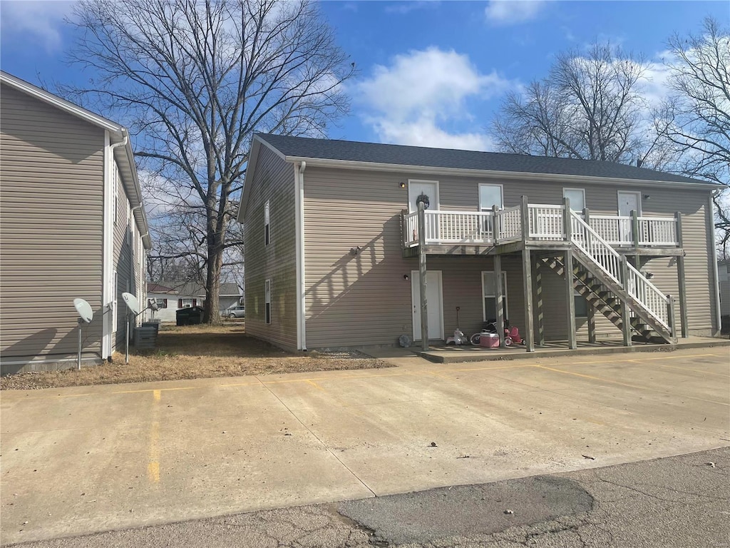 view of front of property featuring a wooden deck