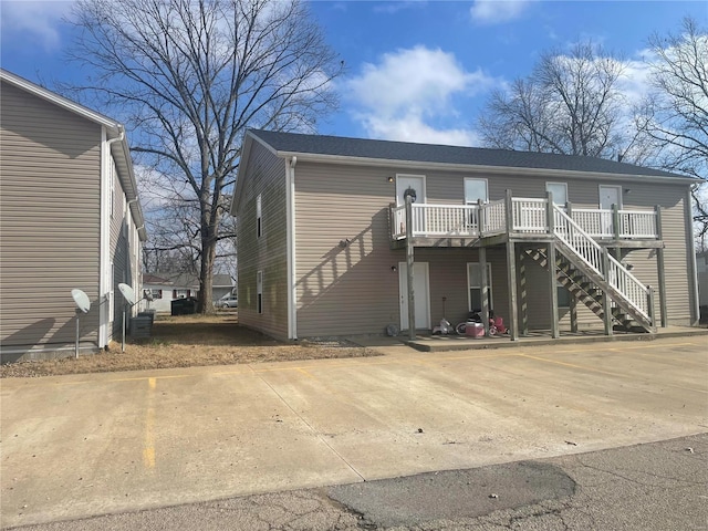 view of front of property featuring a wooden deck