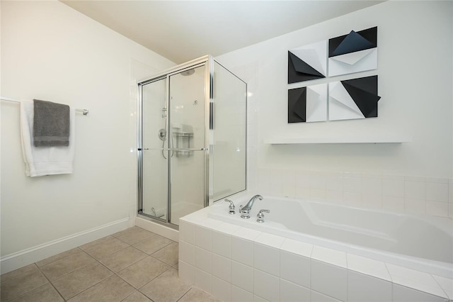 bathroom featuring tile patterned flooring and plus walk in shower