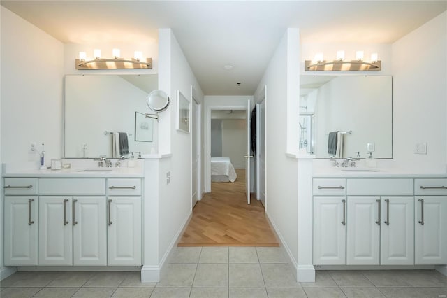 bathroom featuring tile patterned floors and vanity