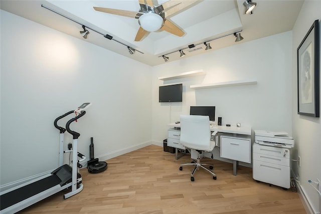 office space featuring ceiling fan and light hardwood / wood-style flooring