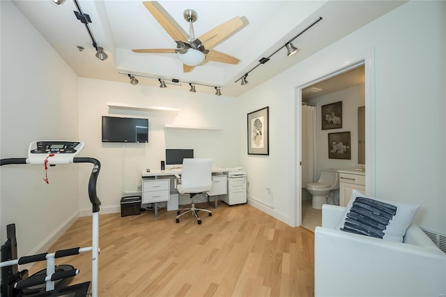 office space featuring light wood-type flooring and ceiling fan