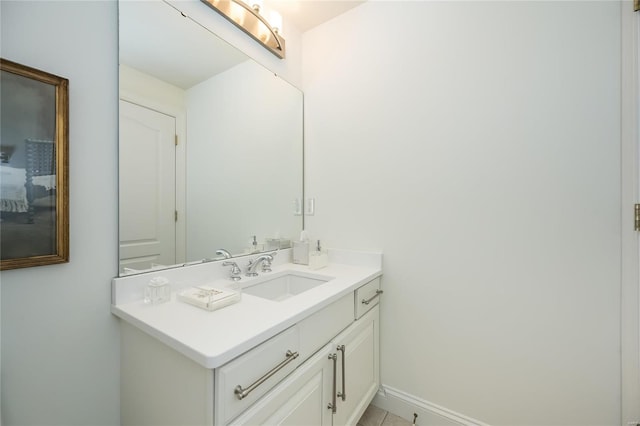 bathroom featuring vanity and tile patterned flooring