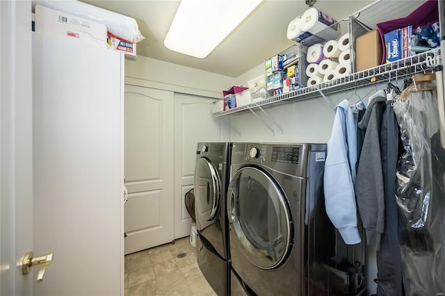 laundry room featuring separate washer and dryer