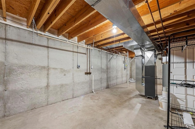 basement featuring heating unit