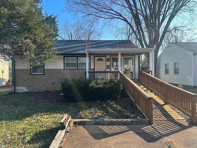 view of front of home featuring covered porch