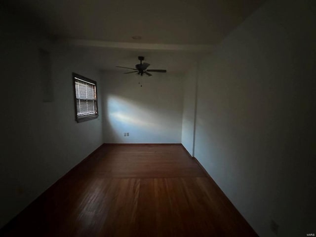 empty room with hardwood / wood-style flooring and ceiling fan