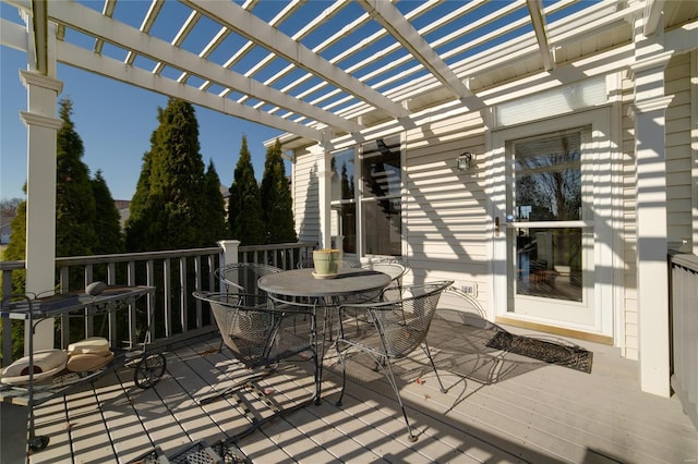 wooden terrace with a pergola