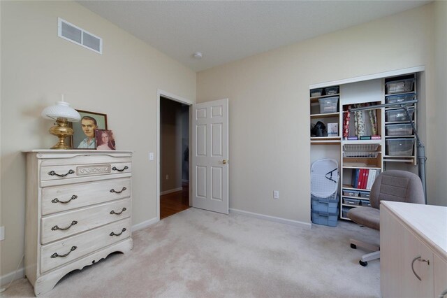 home office with light carpet