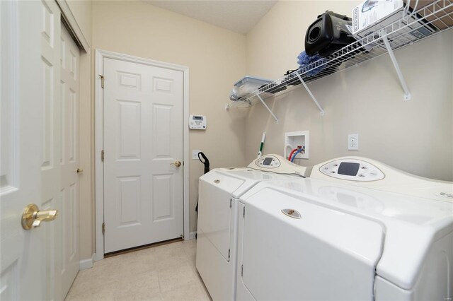 washroom featuring independent washer and dryer