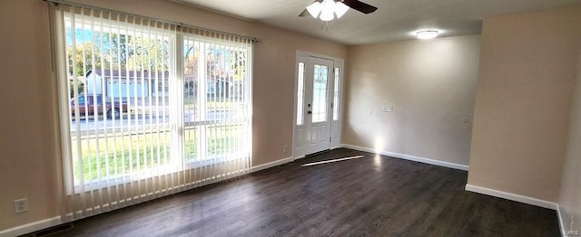 doorway to outside featuring dark hardwood / wood-style flooring and ceiling fan