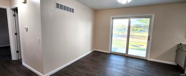 entryway with dark wood-type flooring