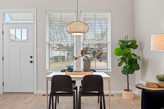 dining room featuring light hardwood / wood-style flooring