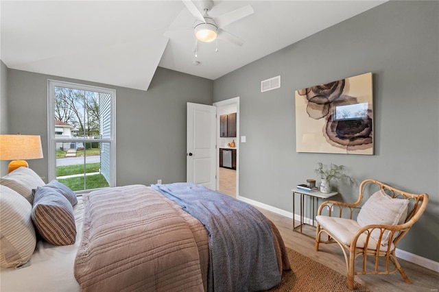 bedroom featuring hardwood / wood-style flooring and ceiling fan