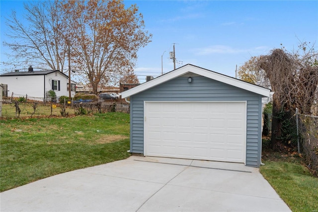 garage featuring a yard