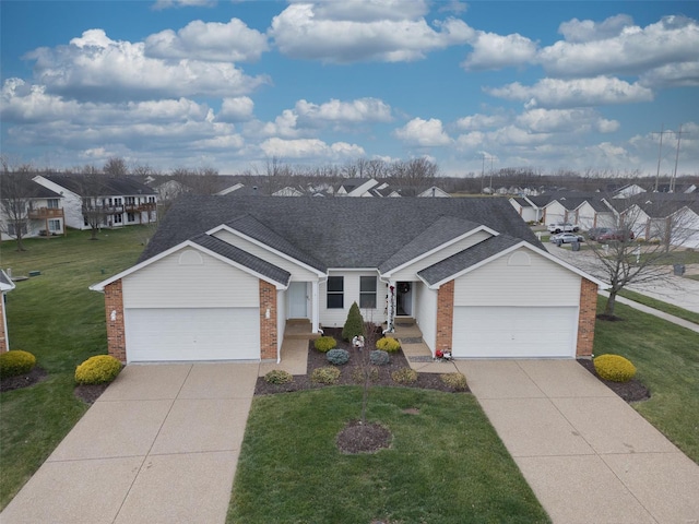 ranch-style home with a front lawn and a garage