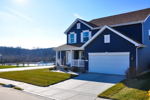 view of front facade featuring a garage and a front yard