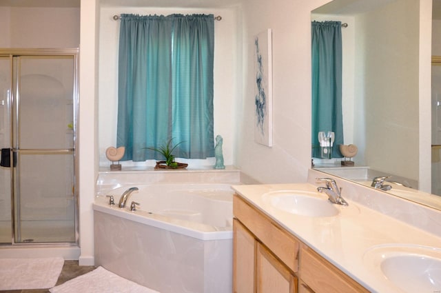 bathroom with plus walk in shower and vanity