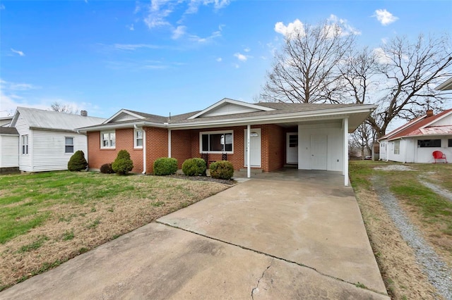 ranch-style house with a front lawn and a carport