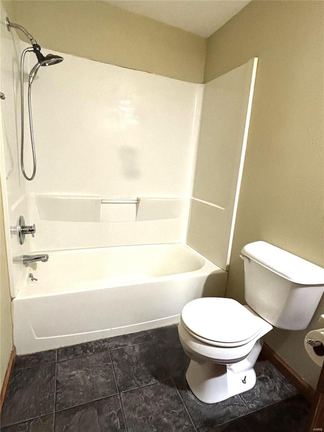 bathroom with shower / bath combination and toilet