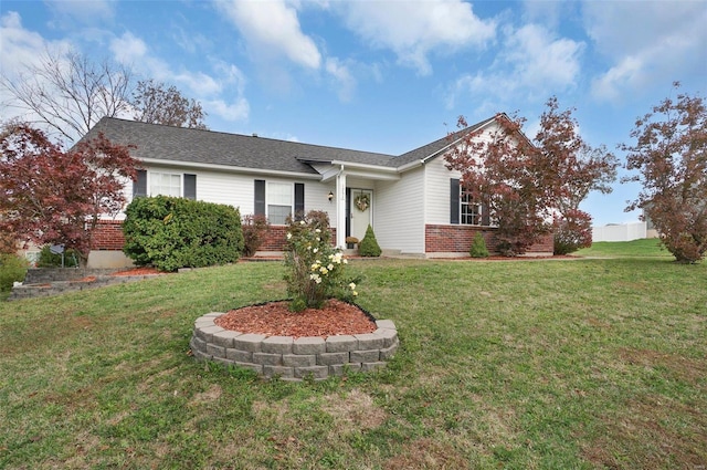 single story home featuring a front lawn