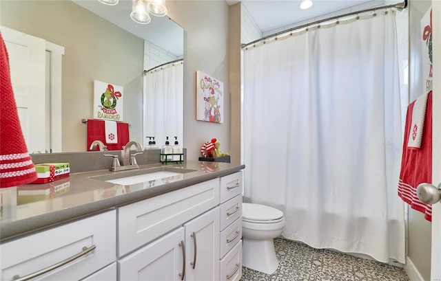 full bathroom featuring toilet, shower / tub combo, and vanity