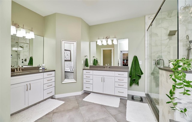 bathroom with walk in shower and vanity